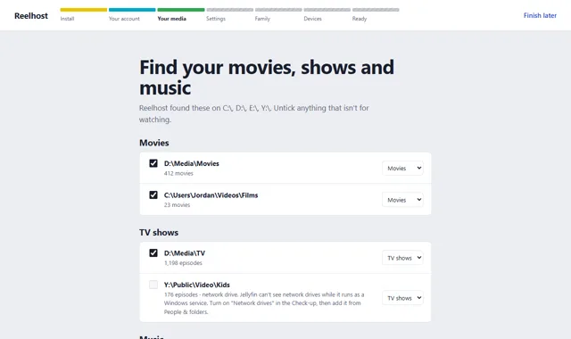 Reelhost's media step: folders found on C, D, E and Y drives, with 412 movies, 1,198 episodes and 2,840 songs, each with a tick.